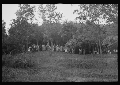 Untitled photo, possibly related to: Funeral procession of first death on project. Boy five years old. Red House Farms, West Virginia