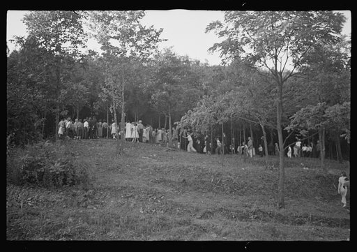 Untitled photo, possibly related to: Funeral procession of first death on project. Boy five years old. Red House Farms, West Virginia