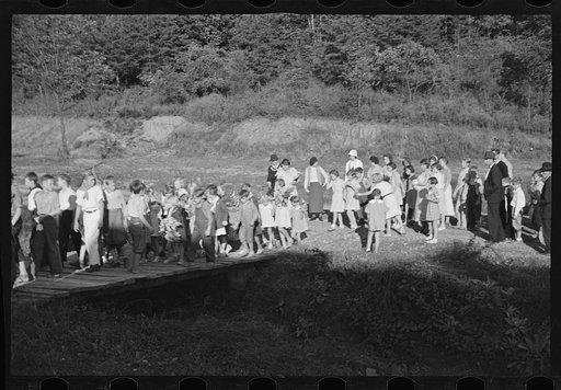 Untitled photo, possibly related to: Funeral procession of first death on project. Boy five years old. Red House Farms, West Virginia