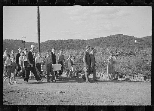 Funeral procession of first death on project. Boy five years old. Red House Farms, West Virginia