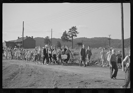 Funeral procession of first death on project. Boy five years old. Red House Farms, West Virginia