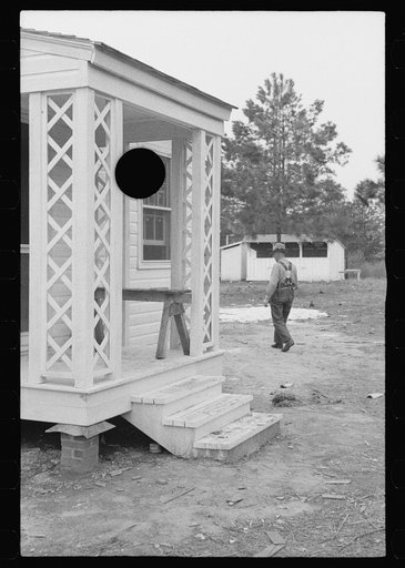 Untitled photo, possibly related to: Carpenter at work, Eatonton, Georgia. Briar Patch Project