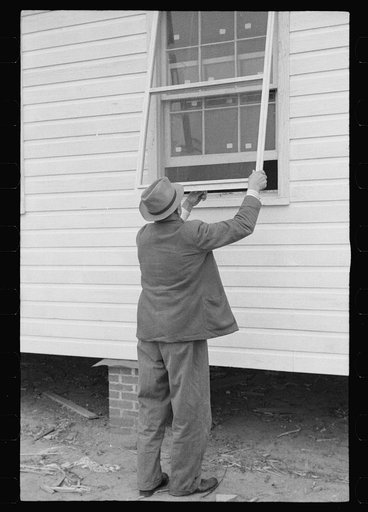 Carpenter at work, Eatonton, Georgia. Briar Patch Project
