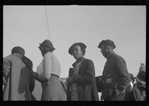 Untitled photo, possibly related to: Negroes in the lineup for food at meal time in the camp for flood refugees, Forrest City, Arkansas