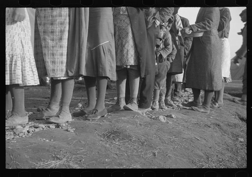 Untitled photo, possibly related to: Negroes in the lineup for food at meal time in the camp for flood refugees, Forrest City, Arkansas