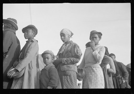 Negroes in the lineup for food at meal time in the camp for flood refugees, Forrest City, Arkansas