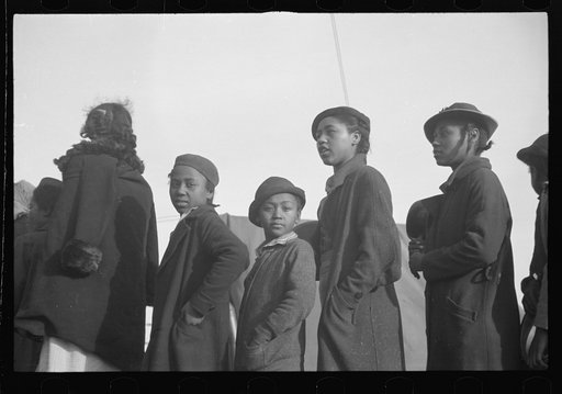 Untitled photo, possibly related to: Negroes in the lineup for food at meal time in the camp for flood refugees, Forrest City, Arkansas