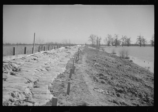 Untitled photo, possibly related to: The Bessie Levee augmented with sand bags during the 1937 flood near Tiptonville, Tennessee