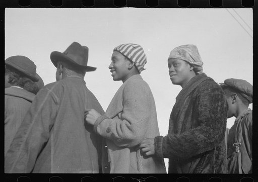 Untitled photo, possibly related to: Negroes in the lineup for food at mealtime in the camp for flood refugees, Forrest City, Arkansas