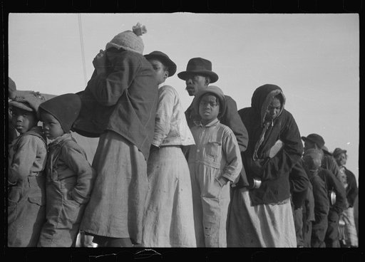 Untitled photo, possibly related to: Negroes in the lineup for food at the flood refugee camp, Forrest City, Arkansas