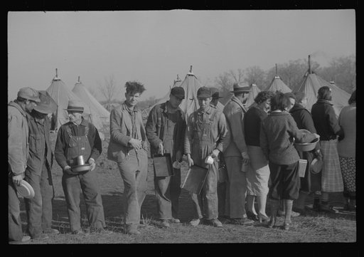 Untitled photo, possibly related to: Negroes in the lineup for food at the flood refugee camp, Forrest City, Arkansas