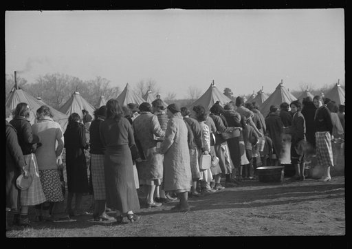 Untitled photo, possibly related to: Refugees lined up at meal time in the camp for white flood refugees in Forest City, Arkansas