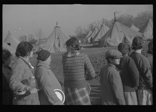 Untitled photo, possibly related to: Refugees lined up at meal time in the camp for white flood refugees in Forest City, Arkansas