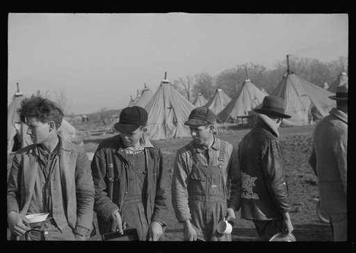 Untitled photo, possibly related to: Refugees lined up at meal time in the camp for white flood refugees in Forest City, Arkansas