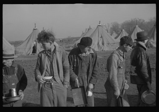 Untitled photo, possibly related to: Refugees lined up at meal time in the camp for white flood refugees in Forest City, Arkansas