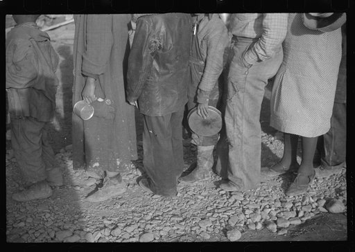Untitled photo, possibly related to: Negroes in the lineup for food at mealtime in the camp for flood refugees, Forrest City, Arkansas