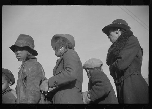 Untitled photo, possibly related to: Negroes in the lineup for food at meal time at the camp for flood refugees, Forrest City, Arkansas