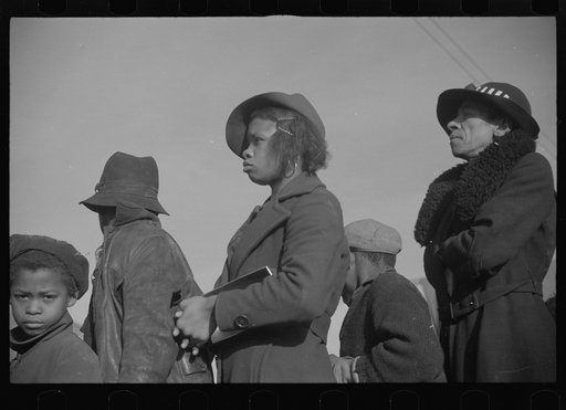 Untitled photo, possibly related to: Negroes in the lineup for food at meal time at the camp for flood refugees, Forrest City, Arkansas