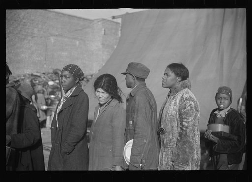 Negroes at mealtime in the flood refugee camp, Forrest City, Arkansas
