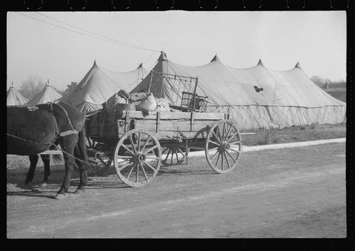 Untitled photo, possibly related to: Refugees lined up at meal time in the camp for white flood refugees in Forest City, Arkansas