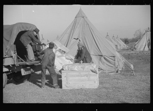 Untitled photo, possibly related to: Refugees lined up at meal time in the camp for white flood refugees in Forest City, Arkansas