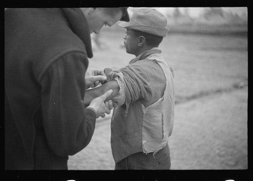 Untitled photo, possibly related to: Vaccination in the camp for Negro flood refugees at Marianna, Arkansas