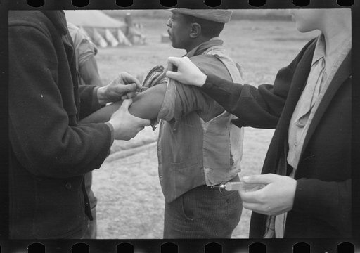 Untitled photo, possibly related to: Vaccination in the camp for Negro flood refugees at Marianna, Arkansas