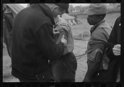 Untitled photo, possibly related to: Vaccination in the camp for Negro flood refugees at Marianna, Arkansas