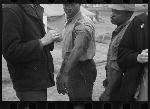 Untitled photo, possibly related to: Vaccination in the camp for Negro flood refugees at Marianna, Arkansas