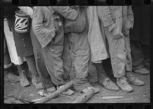 Negroes in the lineup for food at mealtime in the camp for flood refugees, Forrest City, Arkansas