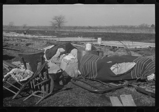 Untitled photo, possibly related to: Setting up a tent in the camp for white flood refugees, Forrest City, Arkansas