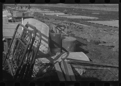 Untitled photo, possibly related to: Setting up a tent in the camp for white flood refugees, Forrest City, Arkansas