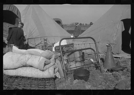 Untitled photo, possibly related to: Setting up a tent in the camp for white flood refugees, Forrest City, Arkansas
