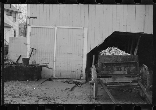 Untitled photo, possibly related to: Barn and farm equipment ruined by flood waters. Hatfield, Massachusetts