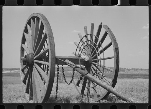 Giant wheels ten feet in diameter, once used for carrying logs to sawmill, Michigan