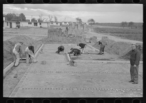 Laying foundation in construction of houses, Hightstown, New Jersey