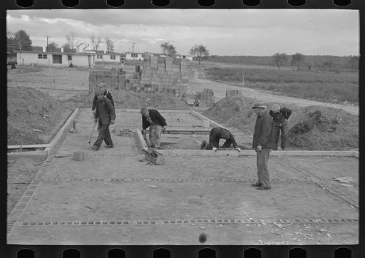 Untitled photo, possibly related to: Laying foundation in construction of houses, Hightstown, New Jersey