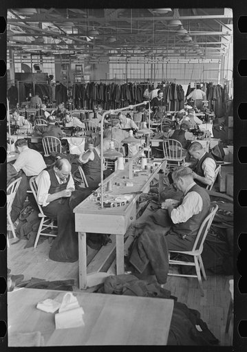 Untitled photo, possibly related to: Interior of cooperative garment factory at Jersey Homesteads, showing some of eighty homesteaders at their work and some of the ladies' coats made by them. Hightstown, New Jersey