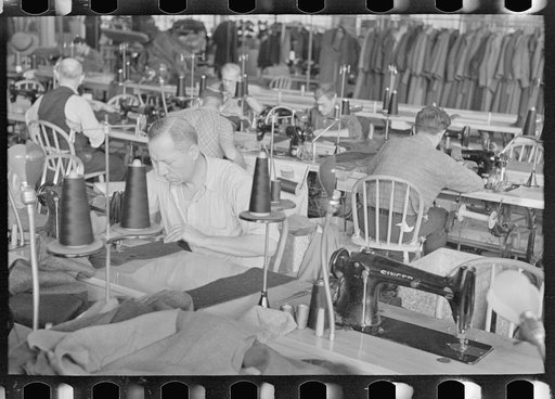 Untitled photo, possibly related to: Interior of cooperative garment factory at Jersey Homesteads, showing some of eighty homesteaders at their work and some of the ladies' coats made by them. Hightstown, New Jersey