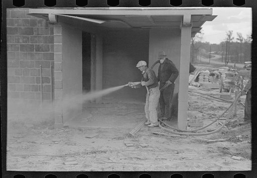Whitewashing a cinderblock house, Jersey Homesteads, Hightstown, New Jersey