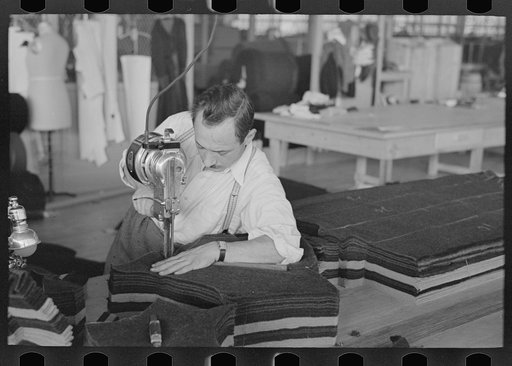 Philip Goldstein assistant cutter in the cooperative garment factory at Jersey Homesteads. He is secretary of the Colonists' Association, Inc., Hightstown, New Jersey
