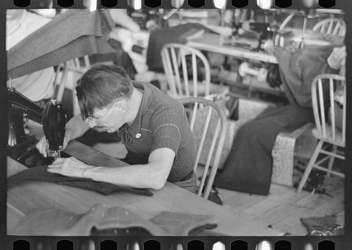 Isadore Snyder, cloak operator, was one of the first to be admitted to Jersey Homesteads because of his aptitude at the machine and his enthusiasm for the success of this cooperative village. Hightstown, New Jersey
