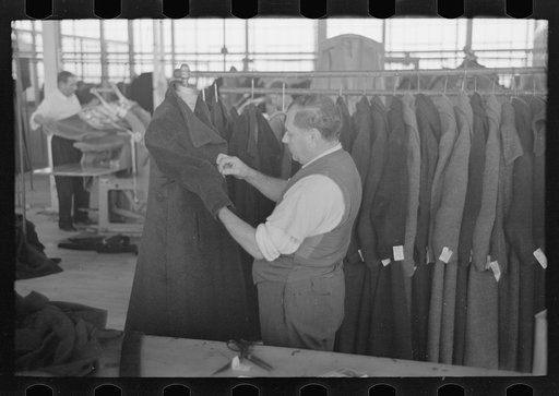 Untitled photo, possibly related to: Ladies' coats manufactured at the cooperative garment factory, Hightstown, New Jersey