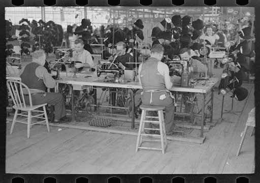 Untitled photo, possibly related to: Making hats at the cooperative garment factory at Jersey Homesteads, Hightstown, New Jersey