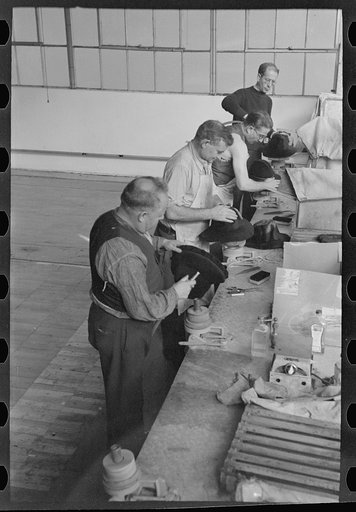 Untitled photo, possibly related to: Making hats in the cooperative garment factory at Jersey Homesteads, Hightstown, New Jersey