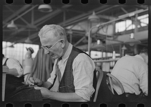 Eugene Isaacs, tailor, in the cooperative garment factory, Jersey Homesteads, Hightstown, New Jersey