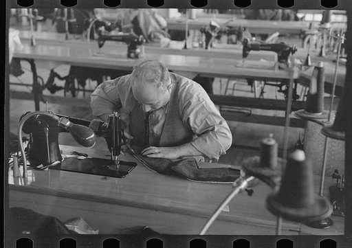 Untitled photo, possibly related to: Closeup of cloak operator in cooperative garment factory at Jersey Homesteads, Hightstown, New Jersey