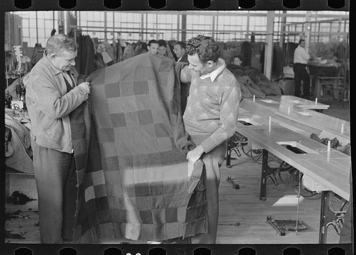 Untitled photo, possibly related to: Harry Kaplan (right) showing blanket which he has made from waste scraps of cloth. Jersey Homesteads, Hightstown, New Jersey