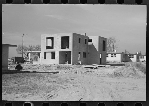 Untitled photo, possibly related to: New type of two-story house under construction. Stucco coat has just been applied, Jersey Homesteads, Hightstown