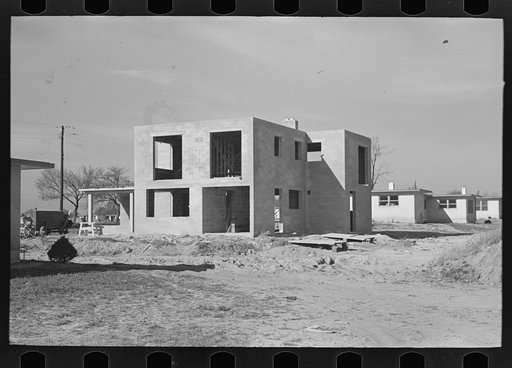 Untitled photo, possibly related to: New type of two-story house under construction. Stucco coat has just been applied, Jersey Homesteads, Hightstown